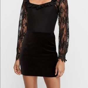 Black velvet mini skirt